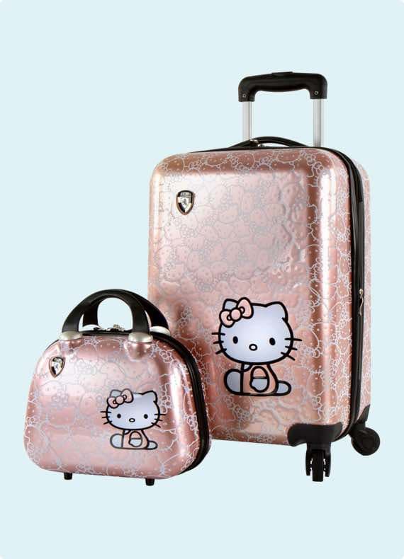 Rosa Kinderkoffer-Set mit großem Rollkoffer und passender Tasche, beide mit Hello-Kitty-Motiv auf der Vorderseite