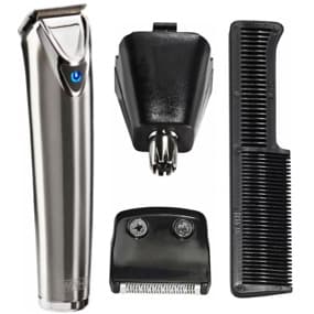 Ein silberner Bartschneider mit verschiedenen Aufsätzen und einem schwarzen Kamm, ideal für präzises Schneiden und Styling.
