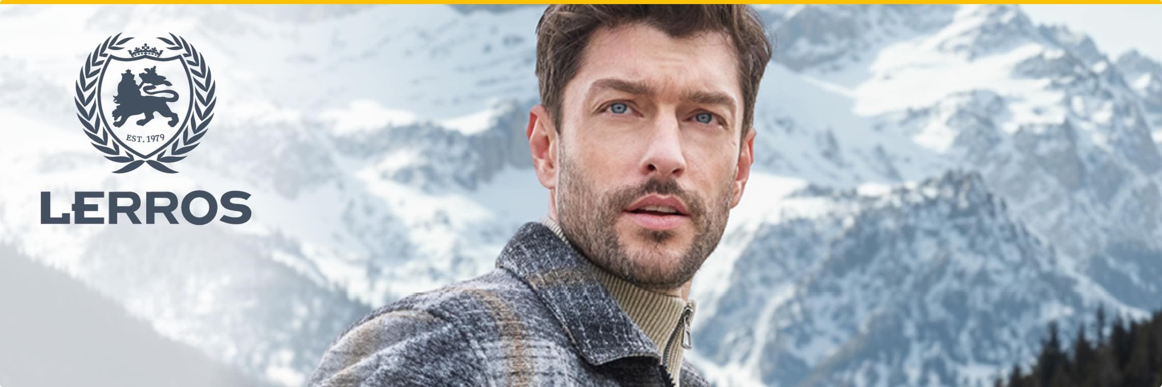 LERROS – Person in kariertem Mantel vor schneebedecktem Bergpanorama
