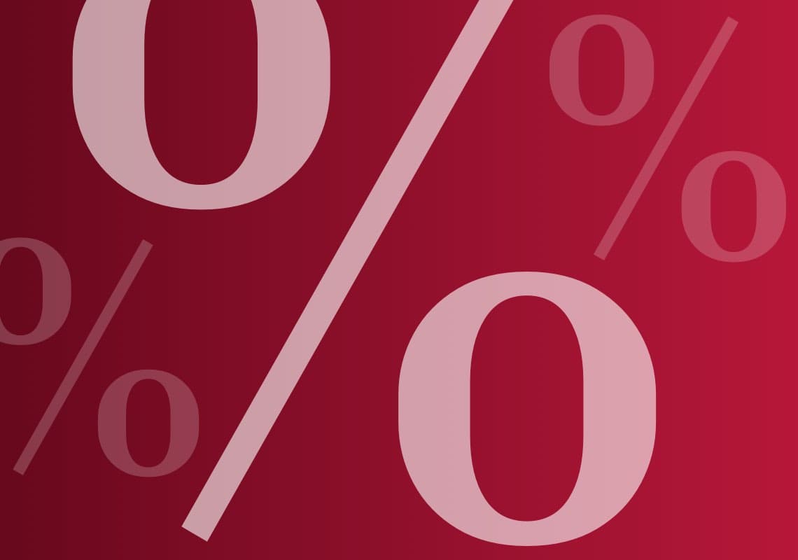 %-Zeichen in verschiedenen Größen auf rotem Hintergrund