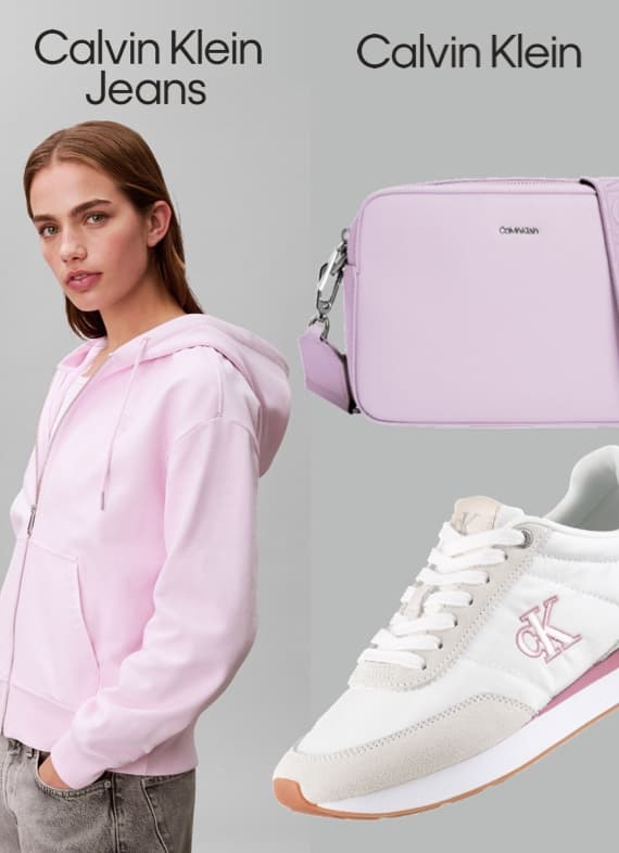Calvin Klein Jeans – Person in rosa Hoodie, Calvin Klein Tasche und Sneaker