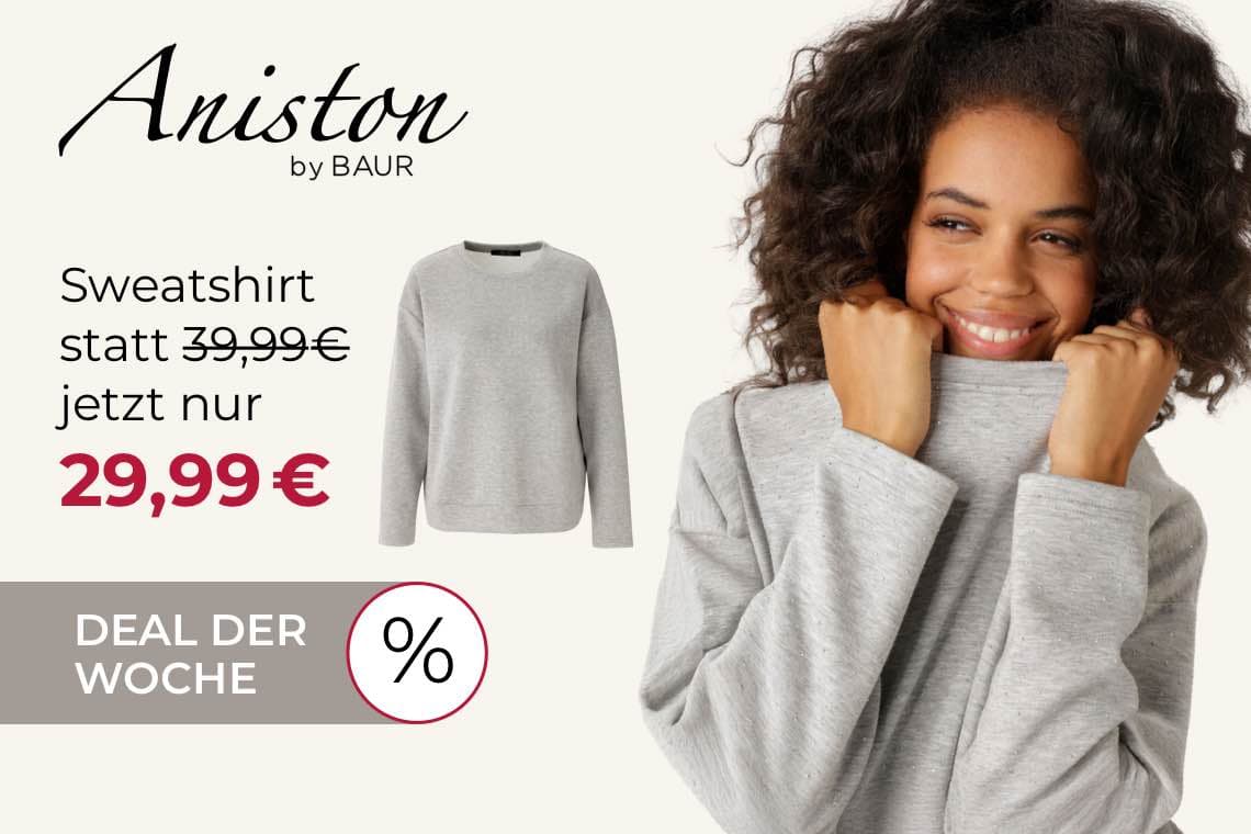 Sweatshirt statt 39,99€ jetzt nur 29,99€ – Deal der Woche – Frau in grauem Sweatshirt mit hochgezogenen Ärmeln
