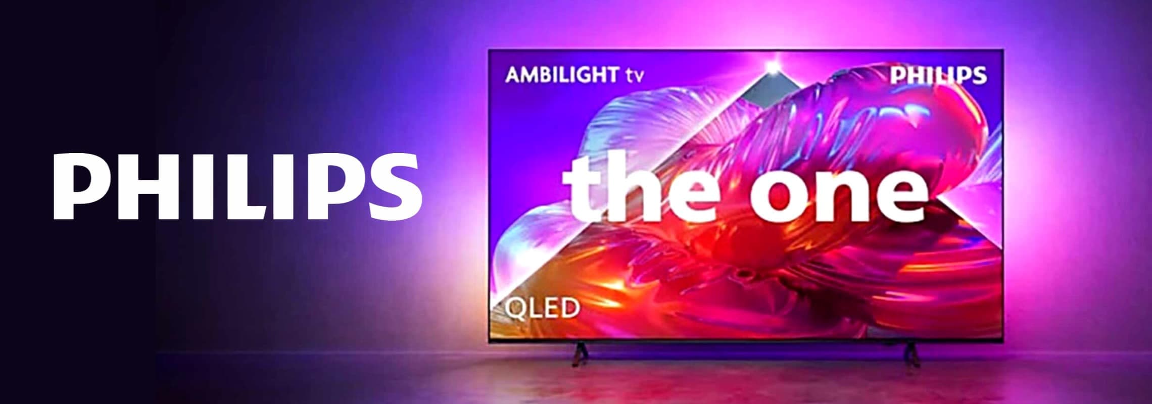 PHILIPS – Ambilight TV „the one“ QLED vor violett leuchtender Wand