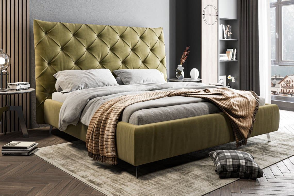 Doppelbett mit hohem, gestepptem Kopfteil, grauer Bettwäsche und brauner Decke in modernem Schlafzimmer mit Fenster