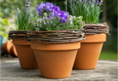 Blumentöpfe dekorieren mit Ästen