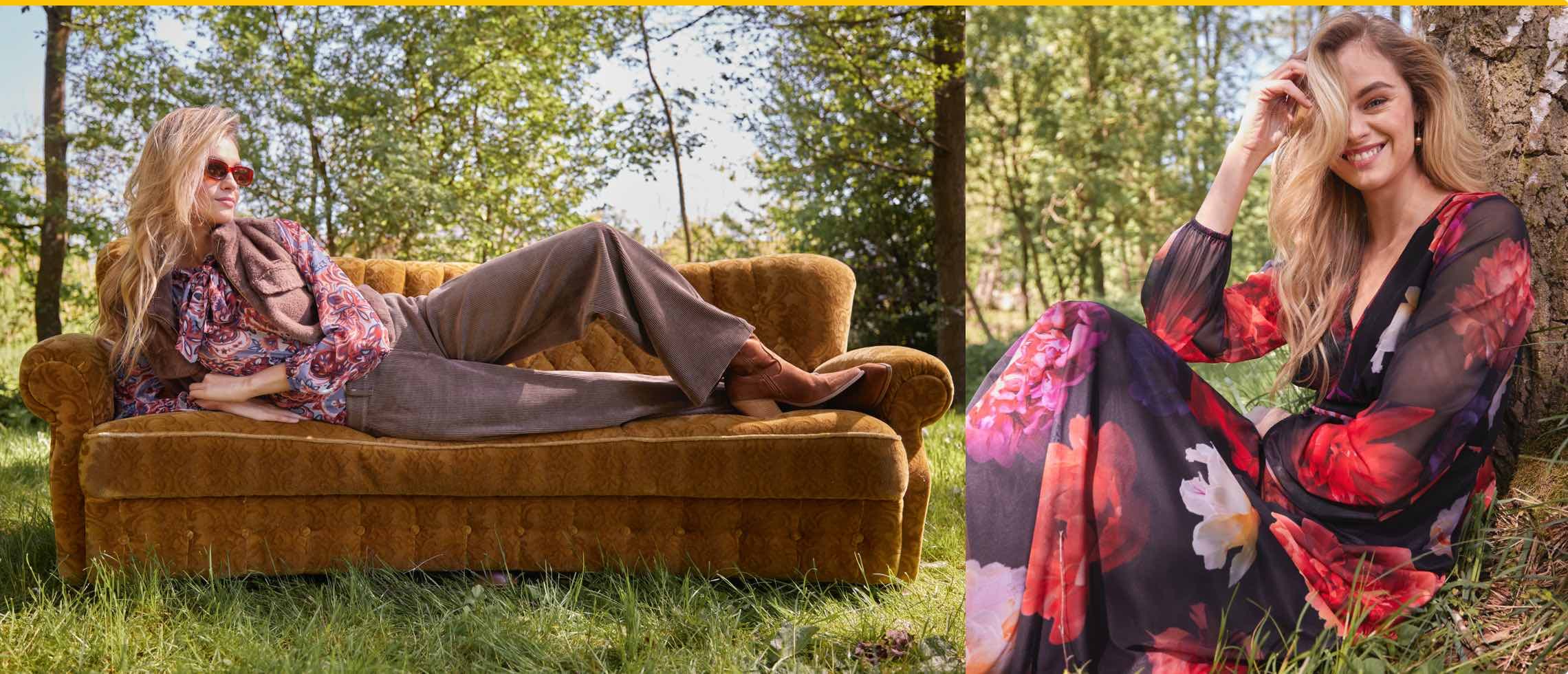 Frau in gemusterter Bluse und Hose liegt auf Sofa im Freien, daneben sitzt Frau im Blumenkleid am Baum angelehnt.