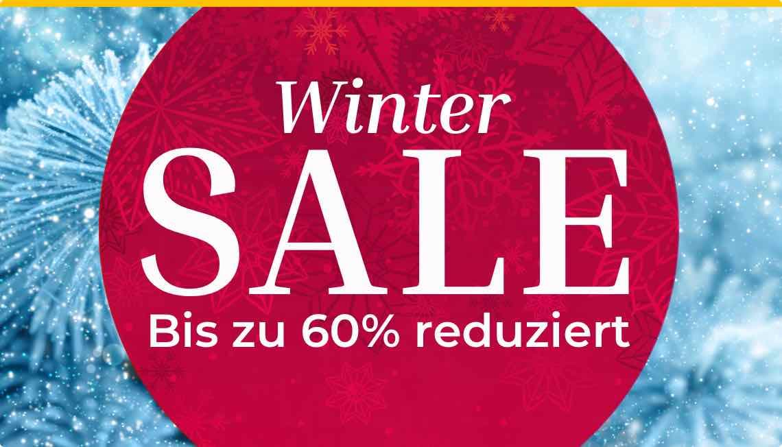 Winter SALE Bis zu 60% reduziert – Roter Kreis vor Schneeflockenhintergrund