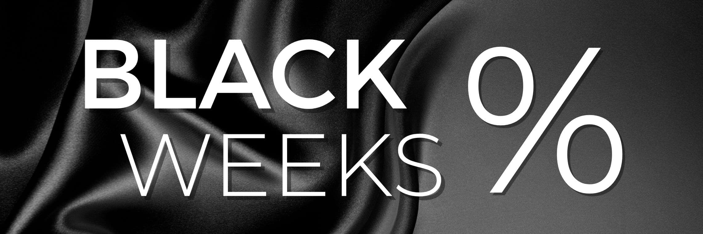 BLACK WEEKS – Weiße Schrift auf schwarzem Hintergrund mit Prozentzeichen