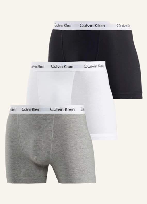 Calvin Klein Boxershorts in Schwarz, Weiß und Grau, übereinander gestapelt, mit Logo auf dem Bund