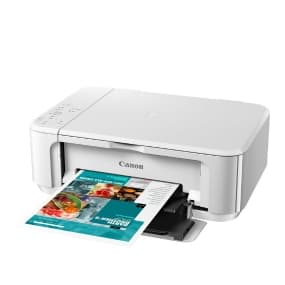 Weißer Canon-Drucker druckt farbiges Dokument mit Essensbildern.