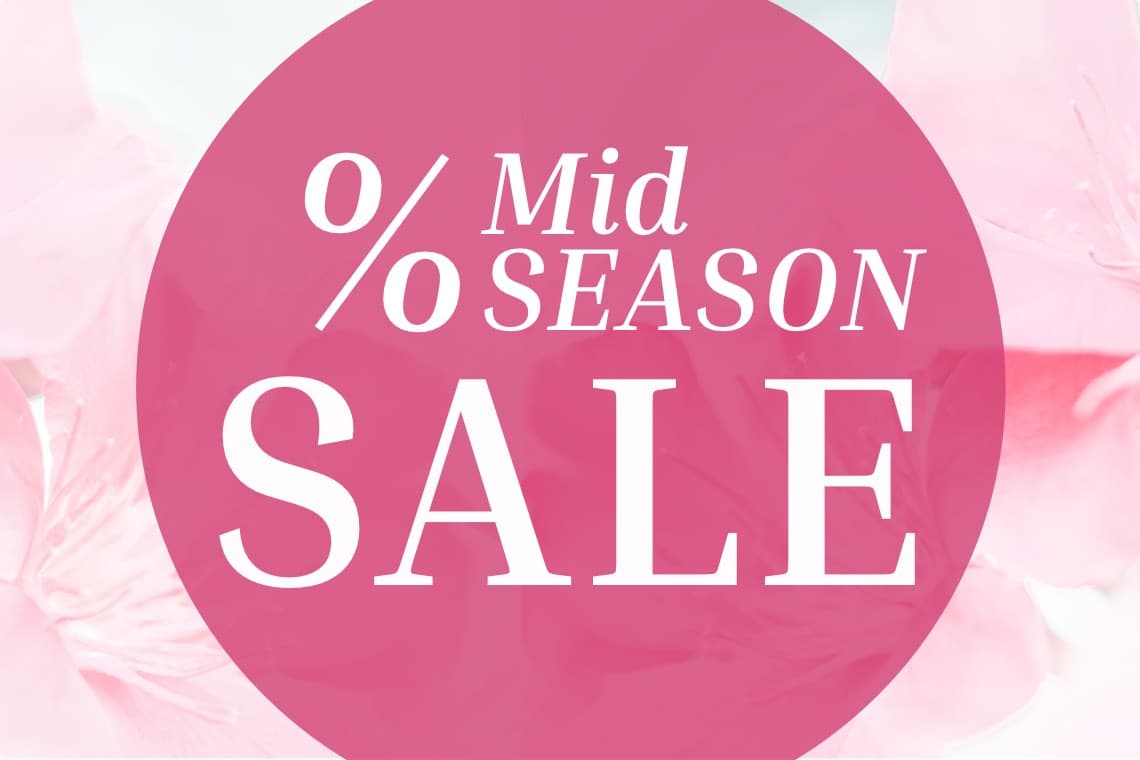 % Mid Season Sale – weißer Schriftzug im pinken Kreis vor zartem Blumenhintergrund