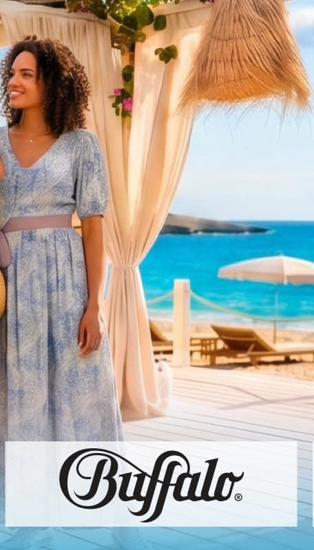 Bis 20.07. 22% auf Buffalo – Frau im Sommerkleid steht unter Pavillon am Strand mit Liegen und Sonnenschirm vor türkisblauem Meer